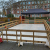 Schaatsbaan 50m² met houten hekjes 